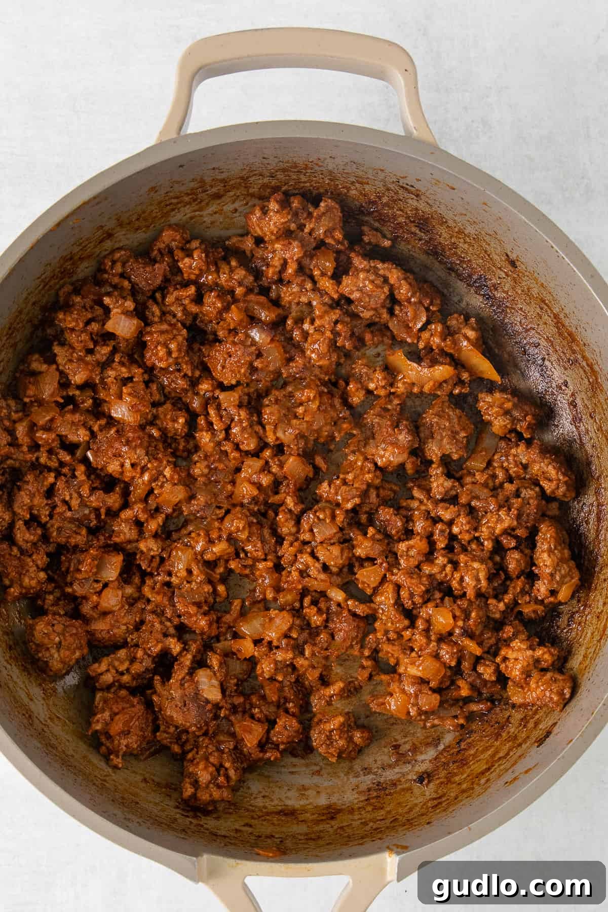 Perfectly Seasoned Ground Beef for Walking Tacos Ground beef for walking tacos in a skillet.