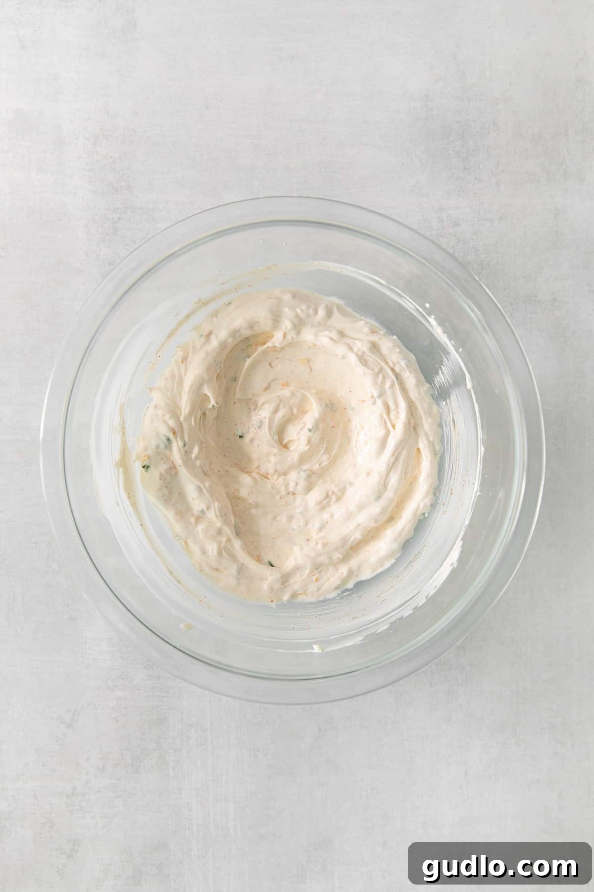 Homemade Chip Dip Ready to Serve A generous bowl of creamy chip dip, perfectly chilled and ready for serving.