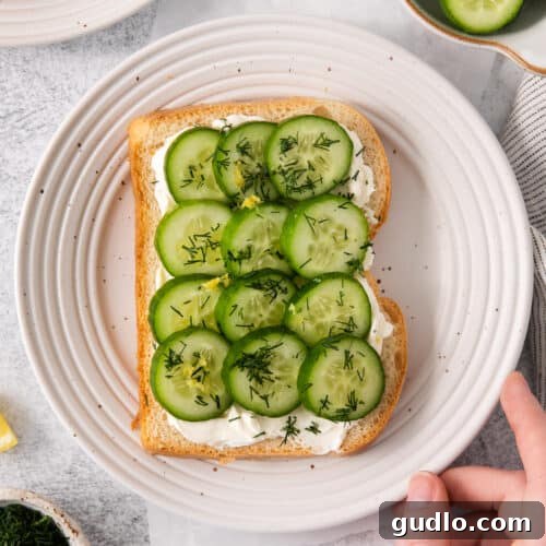 Cucumber sandwiches with cream cheese, cucumbers, and fresh dill.