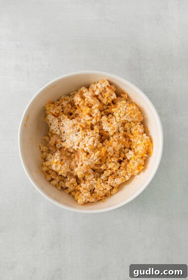 a white bowl filled with cereal on top of a table.