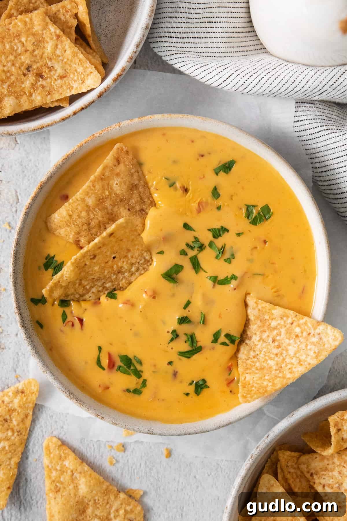 Quick Velveeta Queso: Ready in 15 Minutes 2 A bowl of cheesy dip with tortilla chips.