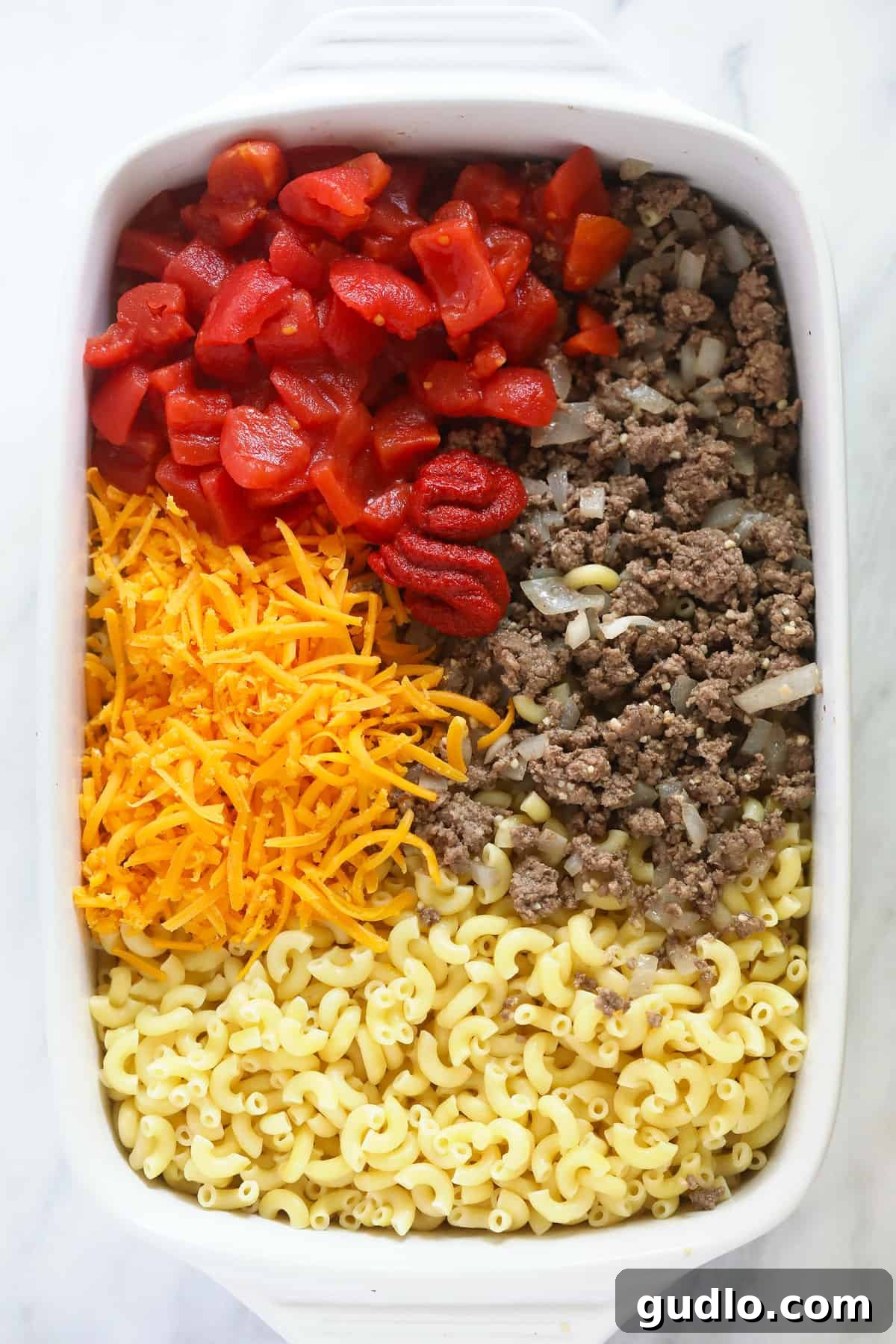 Casserole ingredients in dish.