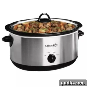 Ultimate Slow Cooker Queso 2 A versatile 7-quart slow cooker, perfect for preparing large batches of delicious meals and dips.