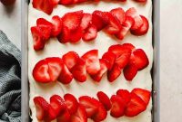 Moist Strawberry Poke Cake with Cream Cheese Frosting