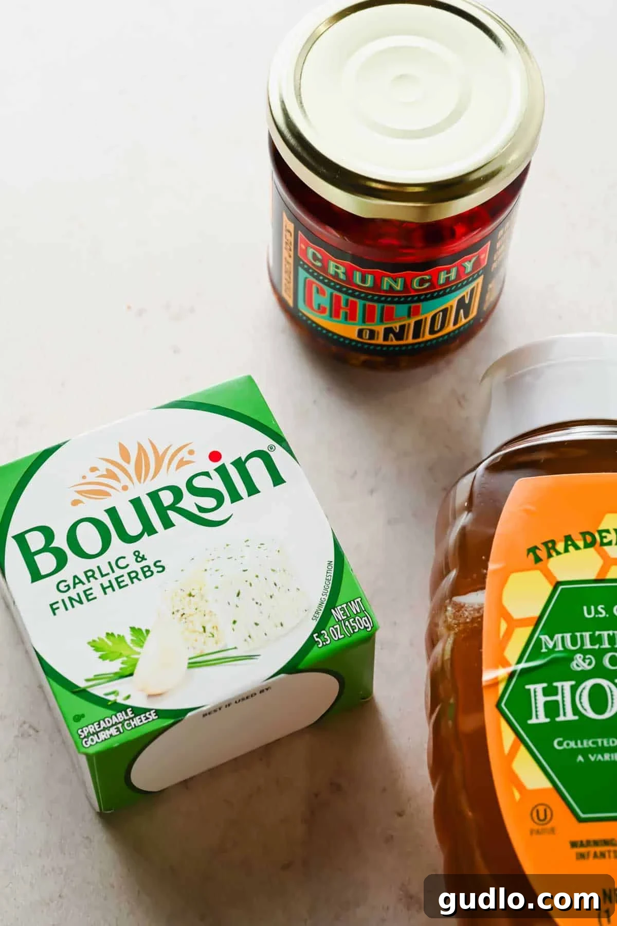 3-Ingredient Boursin Chili Crunch Dip Ready in 5 Minutes 3 Boursin garlic and herb cheese, chili crunch, and honey — all 3 ingredients for boursin chili crunch dip