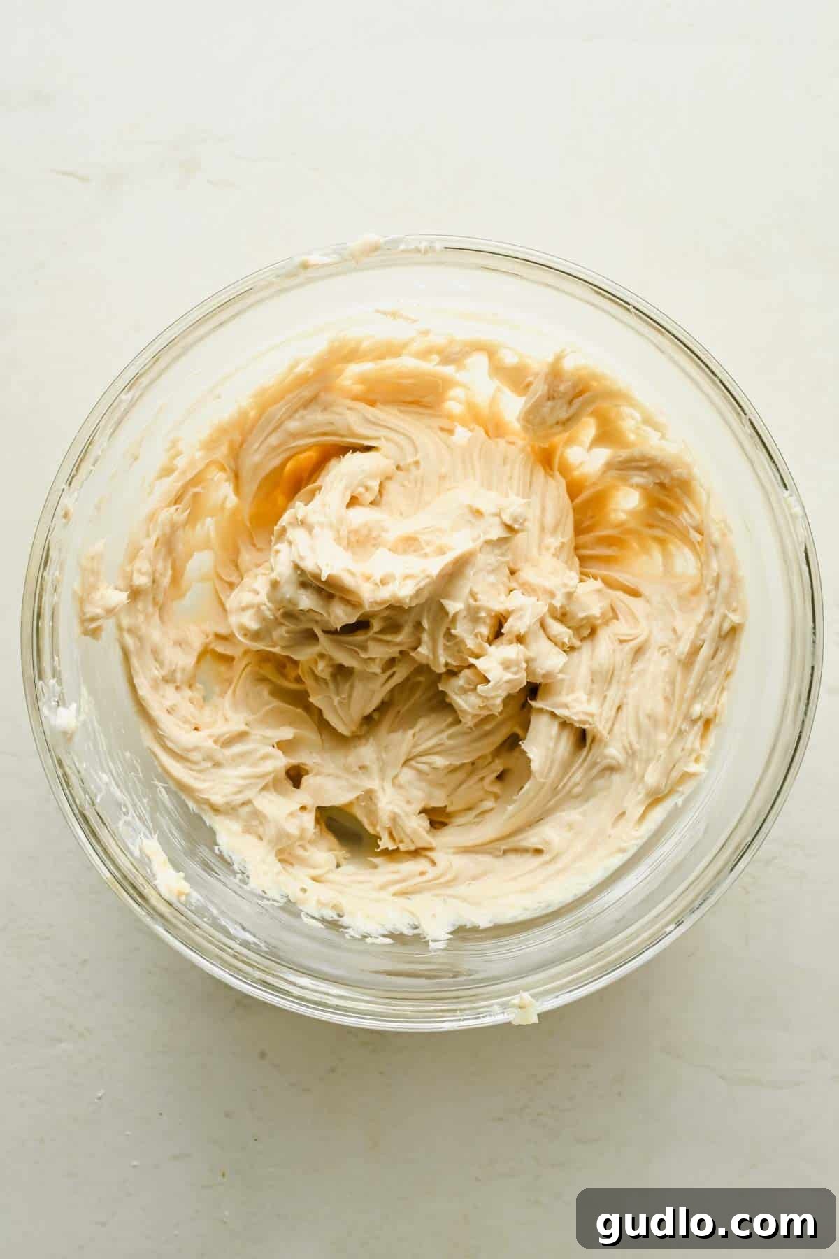 Apple Fritter Bread with Cream Cheese Swirl 5 Cream cheese filling mixed with brown sugar and vanilla in a glass bowl